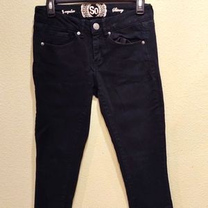 Black mid-rise skinny jeans